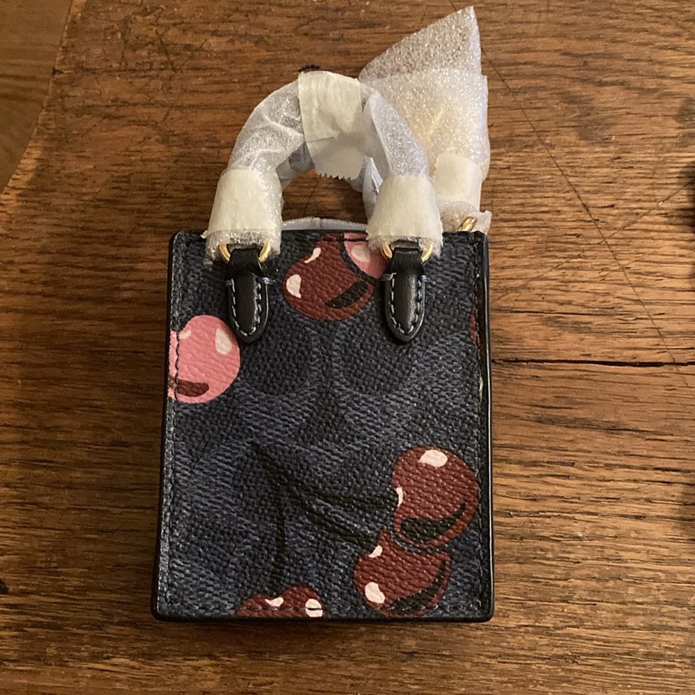 Coach Signature C Cherry Swirl Bucket Hat, Mini Tote Bag Charm & Cherry Bundle - Picture 7 of 9